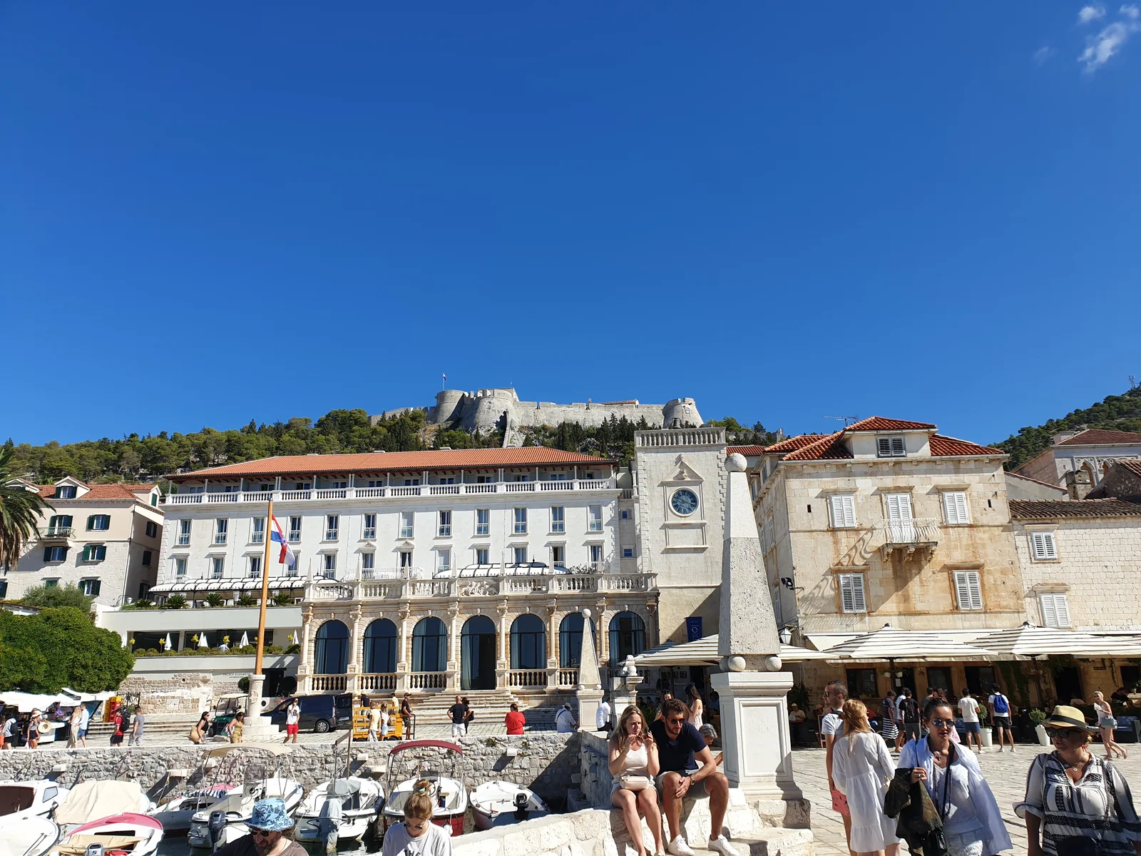 St Stephen's Square in Hvar Town with the Spanish fortress on the hill above