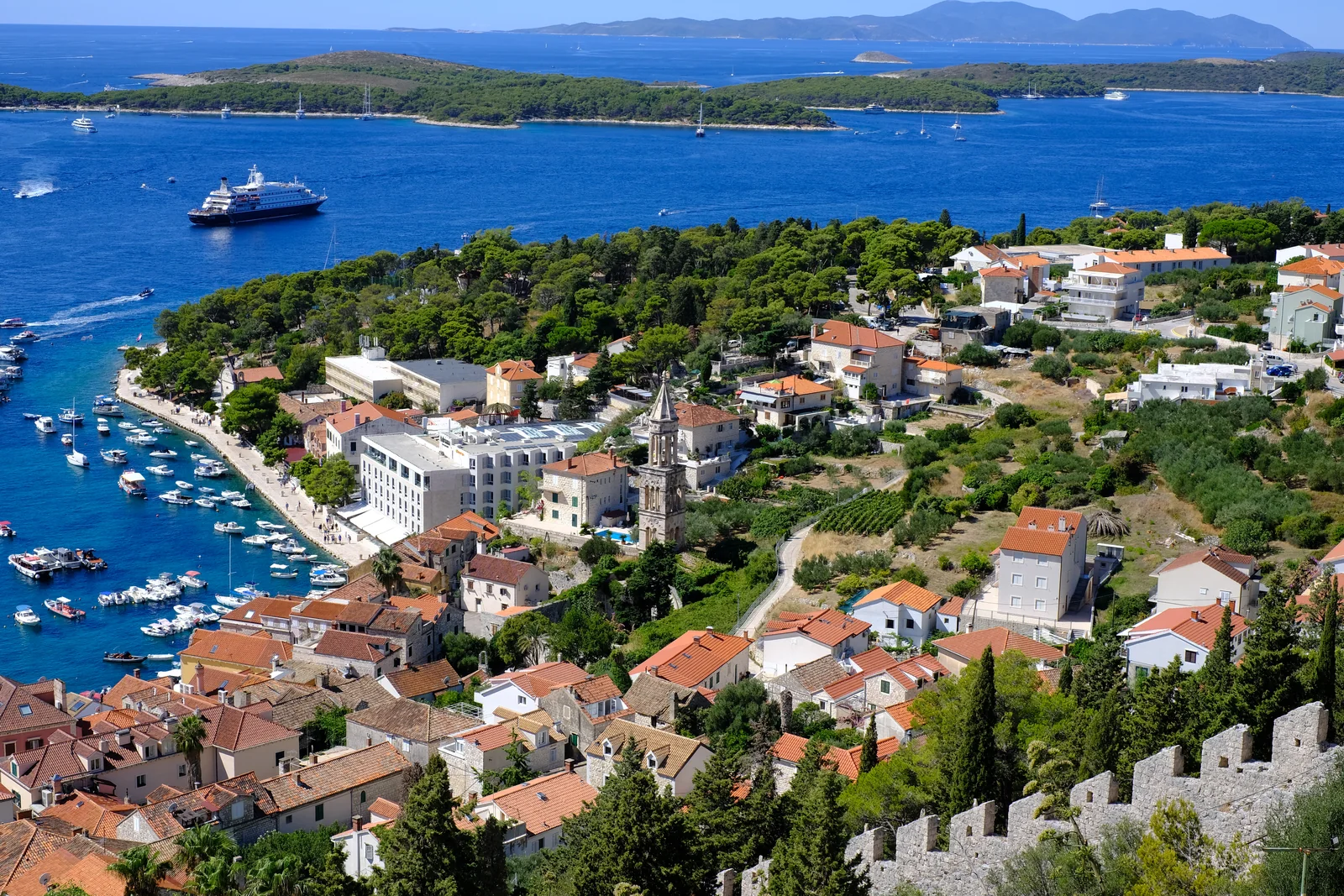 Hvar Town rooftops and harbour seen from the fortress walls