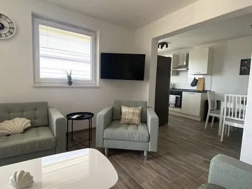 Wohnbereich und Küche von Apartment 2.1 (Vorschau)